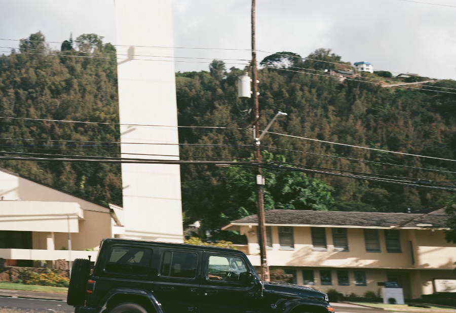 Scenery leaning as camera pans with car