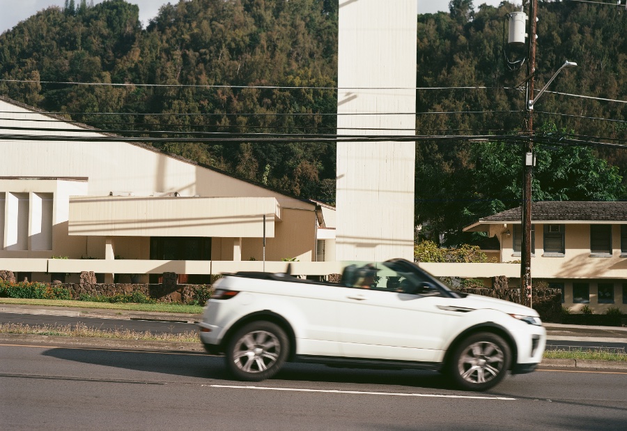 Moving car leaning forward